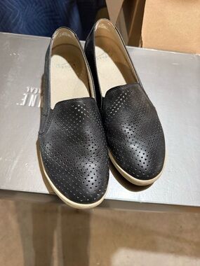 Dansko Black Perforated Slip-On Flats with Cream Soles